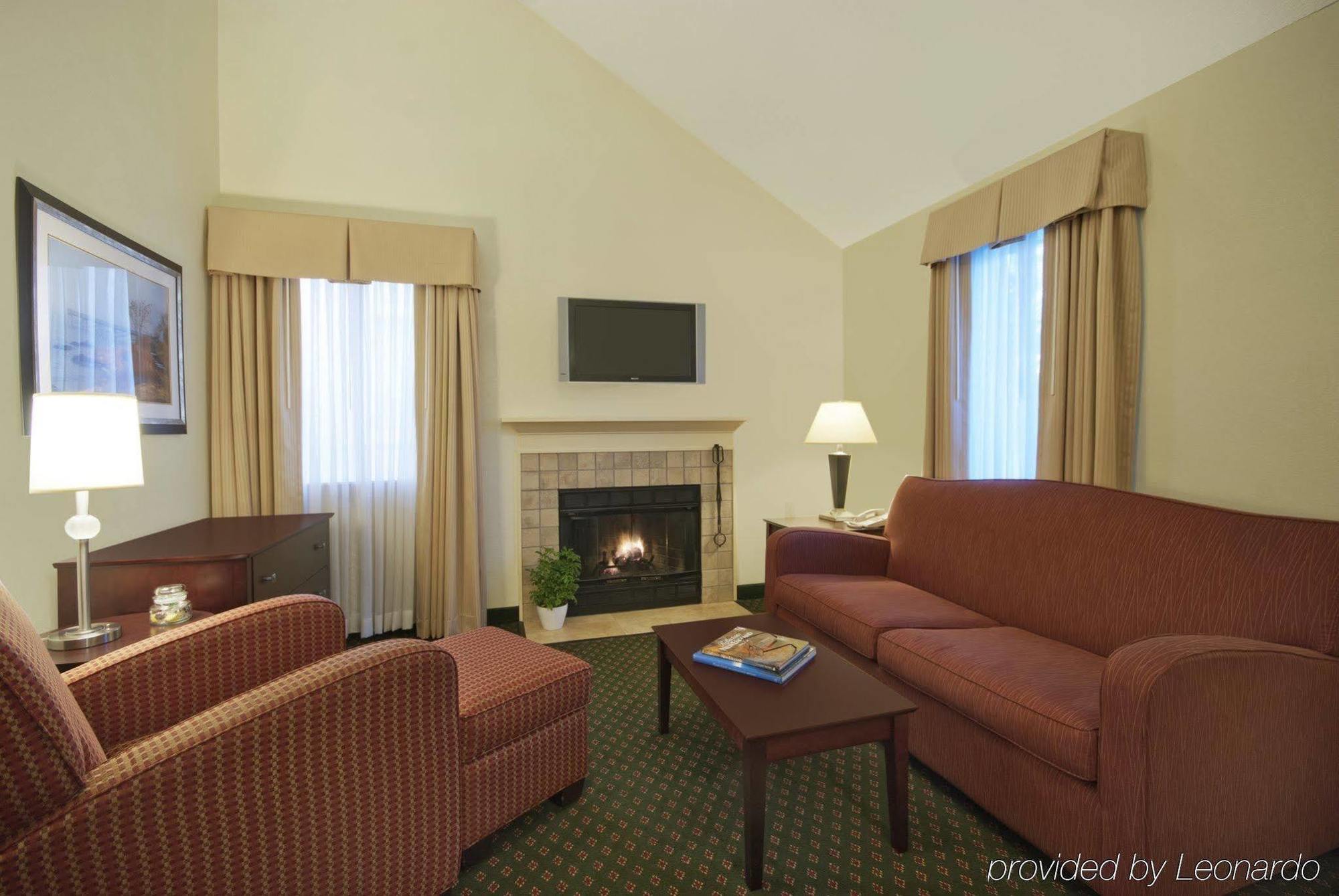 New Haven Village Suites Habitación foto